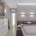 Спальня с панелями 3D в изголовье